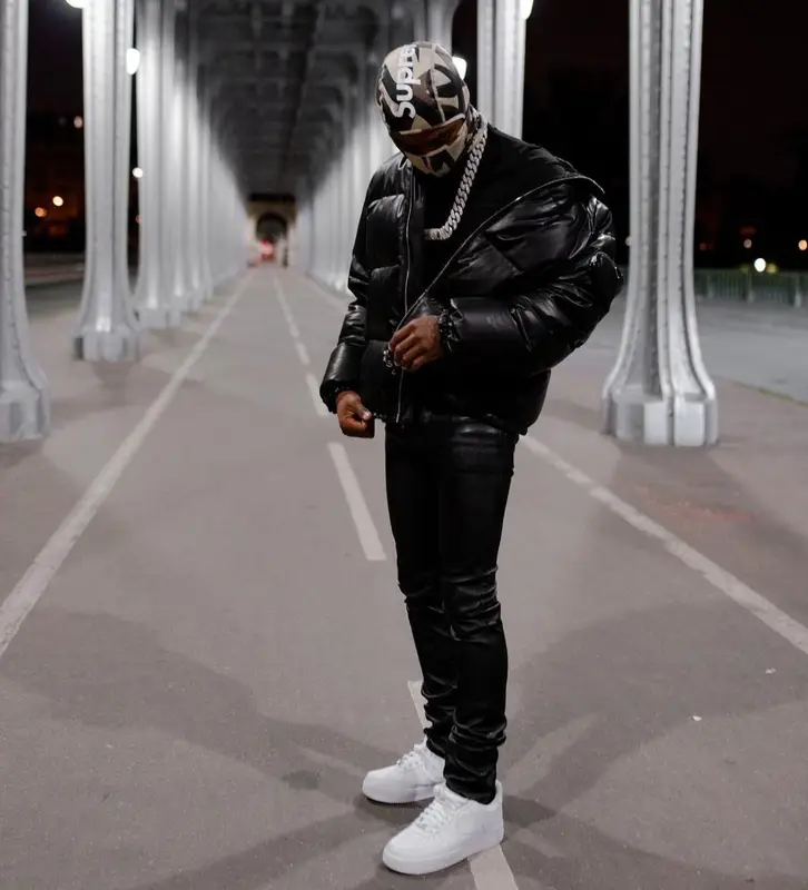 Roddy Ricch outfit in Prada, Amiri, and Supreme, 2021
