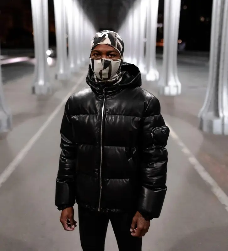 Roddy Ricch outfit in Prada, Amiri, and Supreme, 2021