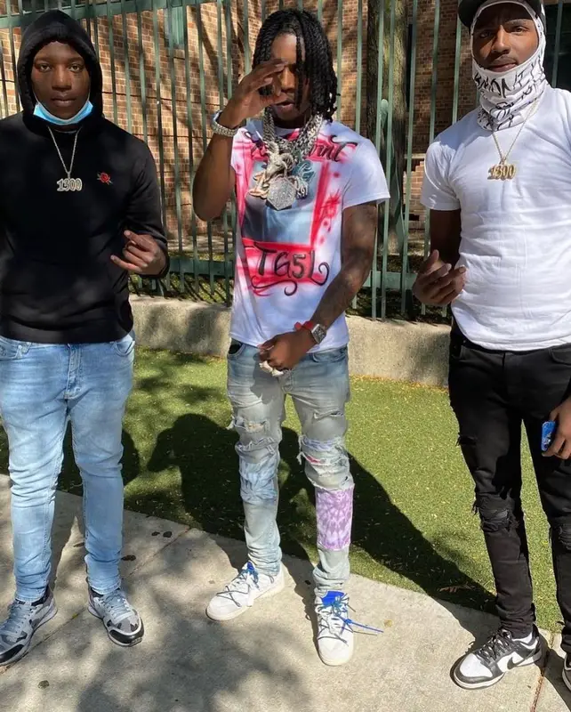Polo G outfit in Amiri, Nike, and MCM, 2021