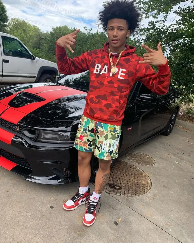Mikey outfit in Bape, El Capitan Cartel, and Nike, 2021