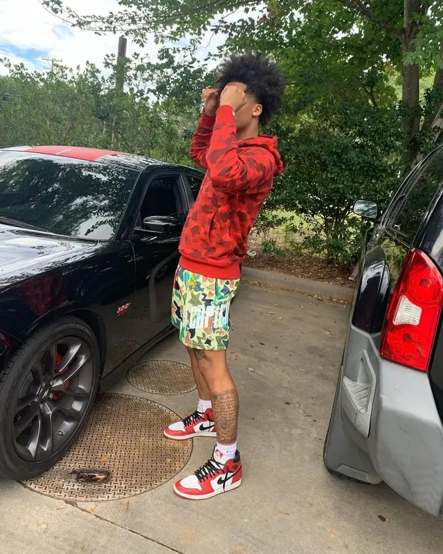 Mikey outfit in Bape, El Capitan Cartel, and Nike, 2021