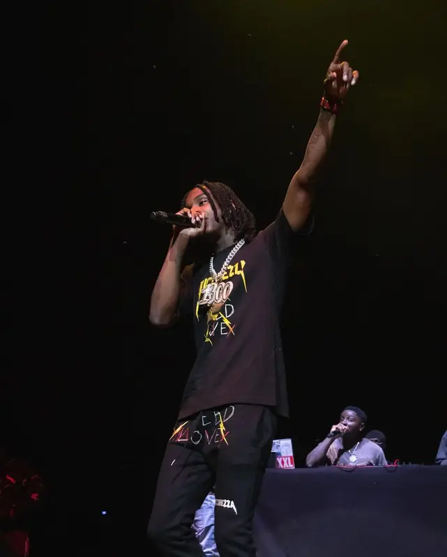 Polo G outfit in Ricchezza Forever, Chrome Hearts, and Jordan, 2021