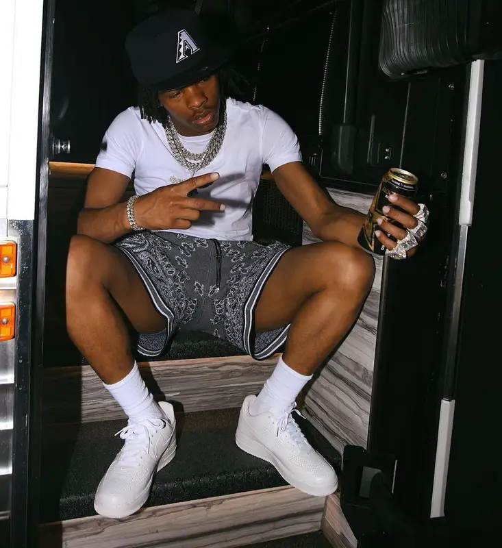Lil Baby outfit in Amiri, Nike, and New Era, 2021