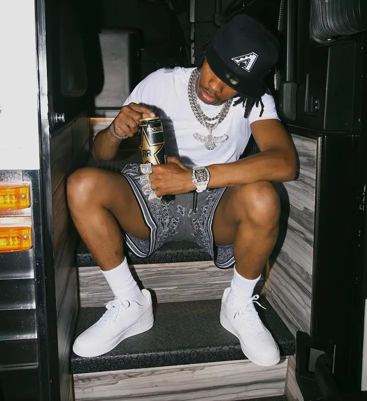 Lil Baby outfit in Amiri, Nike, and New Era, 2021