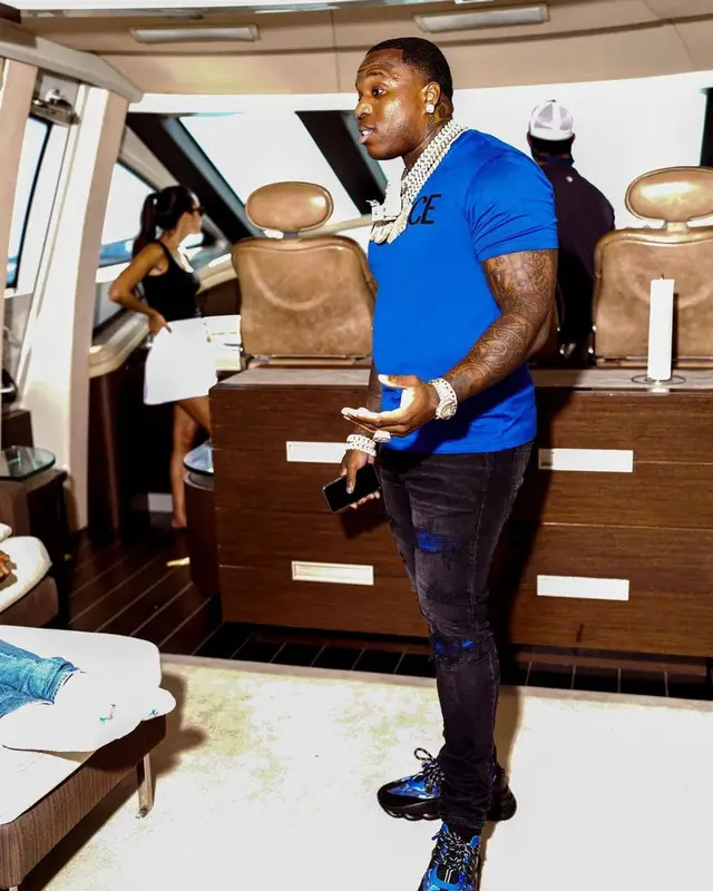 BandMan Kevo outfit in Versace and Amiri, 2021
