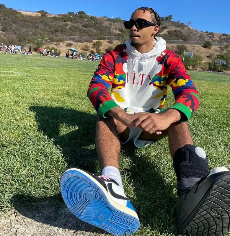 Amari Bailey outfit in Valentino, Nike, and Travis Scott Merch, 2021