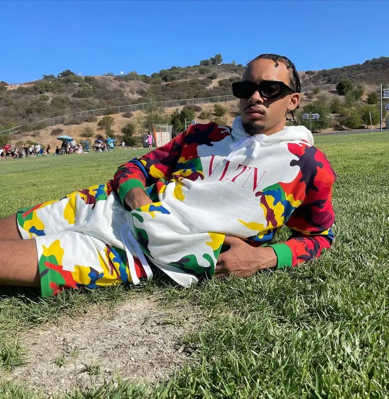 Amari Bailey outfit in Valentino, Nike, and Travis Scott Merch, 2021