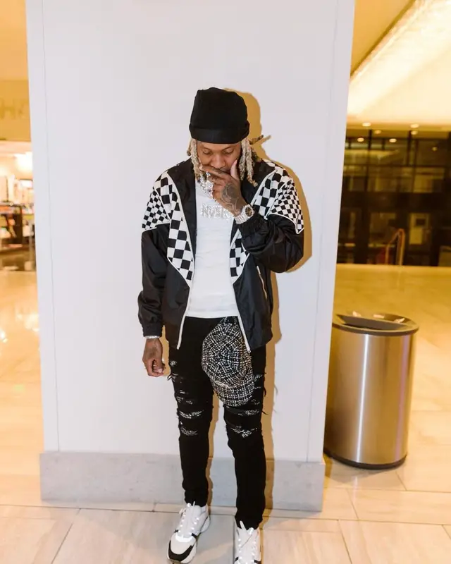 Lil Durk outfit in Celine, Amiri, and Louis Vuitton, 2021