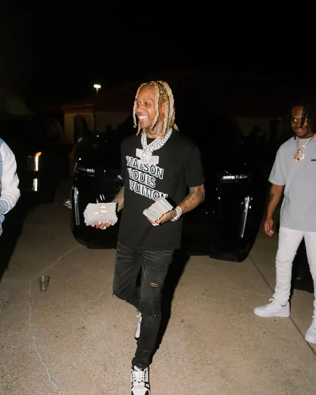 Lil Durk outfit in Louis Vuitton and Amiri, 2021