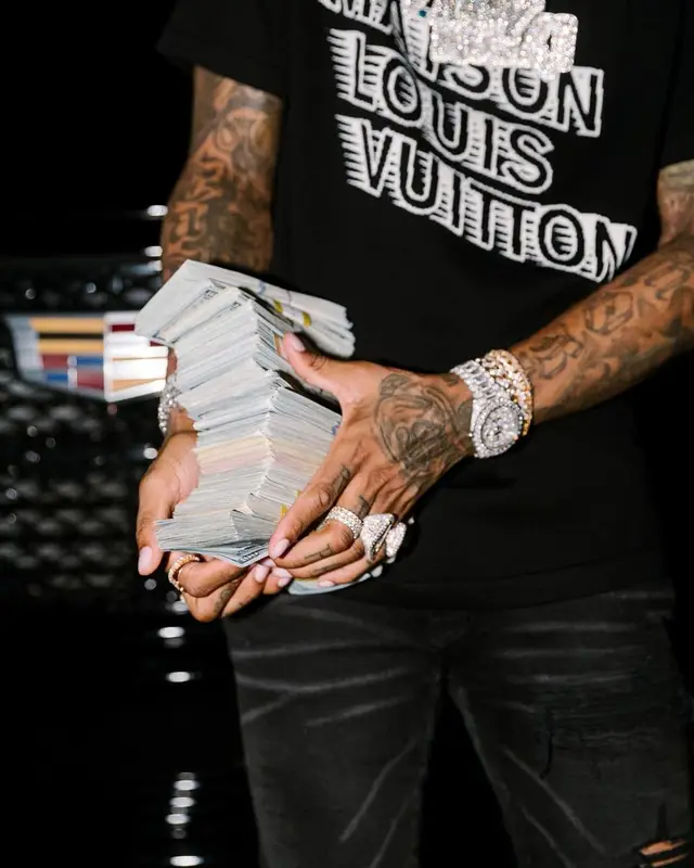 Lil Durk outfit in Louis Vuitton and Amiri, 2021