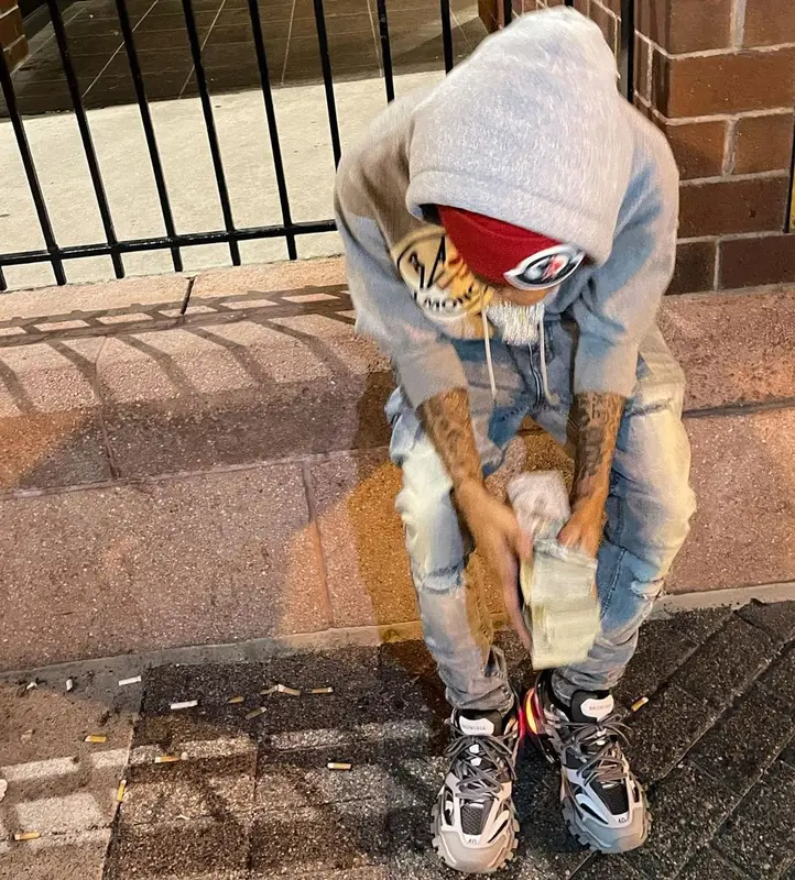 Lil Poppa outfit in Ksubi, Balenciaga, and Moncler, 2021
