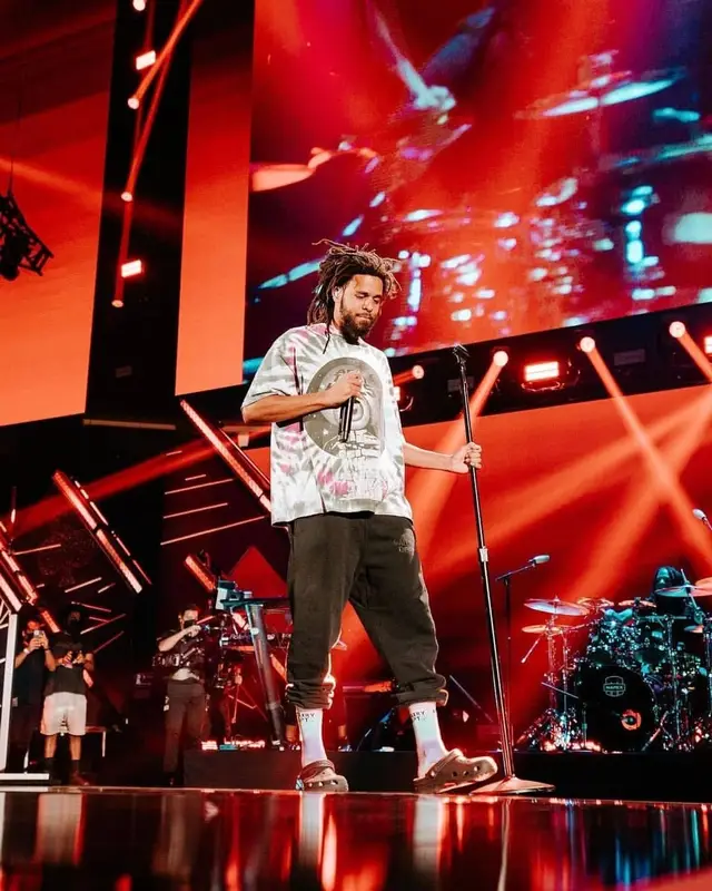 J. Cole outfit in Gallery Dept. and Crocs, 2021