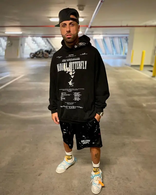 Nicky Jam outfit in Other Scenes, Gallery Dept., and Nike, 2021