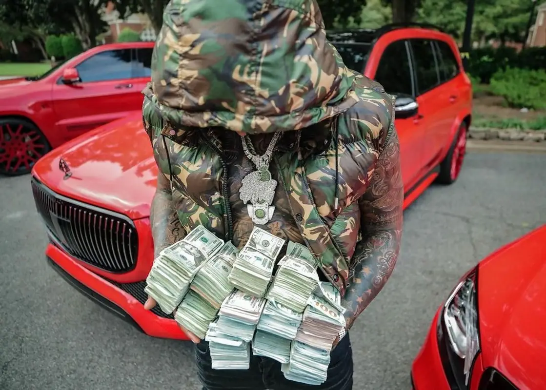 Moneybagg Yo outfit in Celine, Amiri, and Calvin Klein, 2021