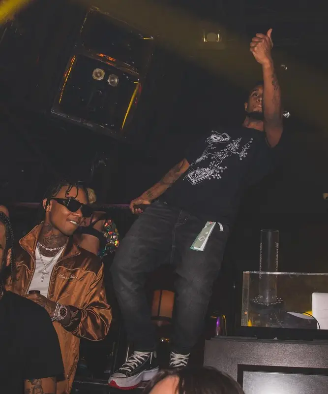 Slim Jxmmi outfit in Off-White, Amiri, and Converse, 2021