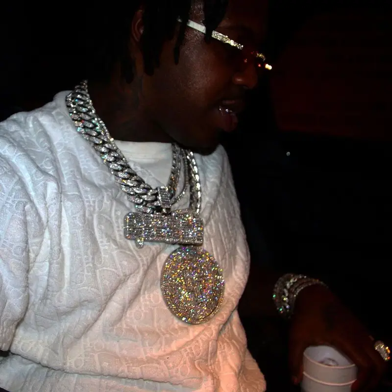 EST Gee outfit in Dior, Amiri, and Cartier, 2021