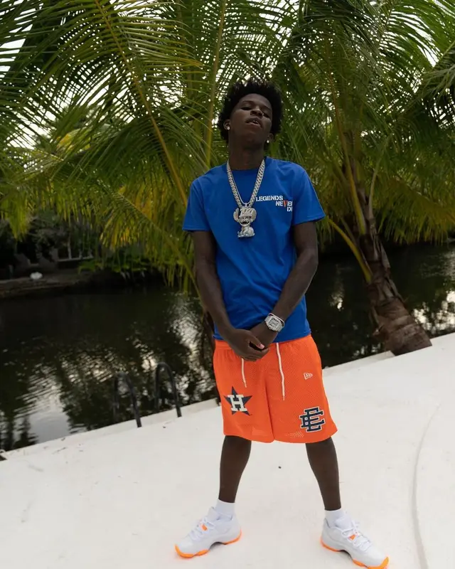 Quando Rondo outfit in Vlone, New Era, and Juice Wrld Merch, 2021
