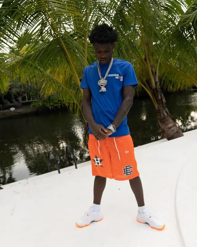 Quando Rondo outfit in Vlone, New Era, and Juice Wrld Merch, 2021