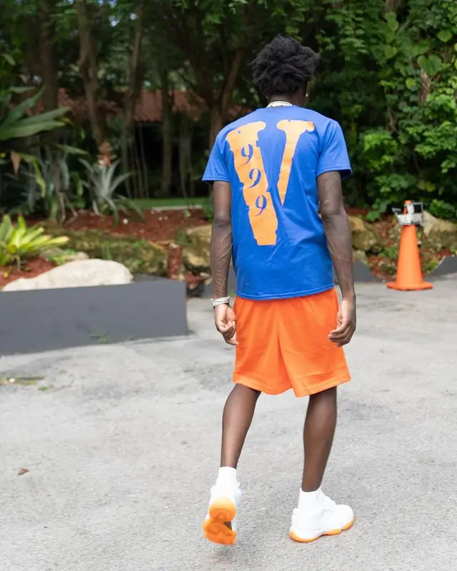 Quando Rondo outfit in Vlone, New Era, and Juice Wrld Merch, 2021