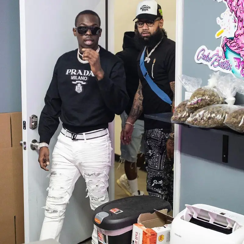 Bobby Shmurda outfit in Prada, Amiri, and Louis Vuitton, 2021