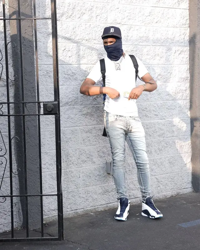 Lil Keed outfit in Ksubi, Gucci, and New Era, 2021