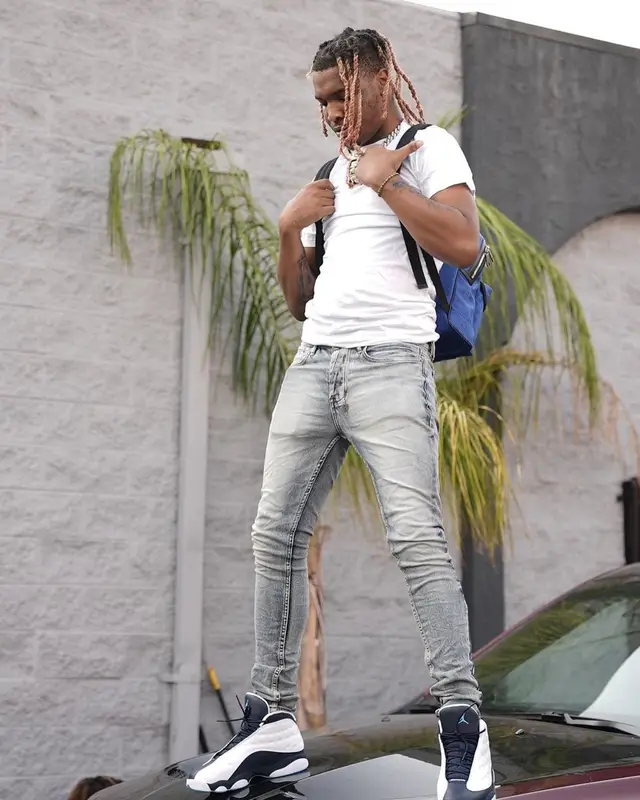 Lil Keed outfit in Ksubi, Gucci, and New Era, 2021