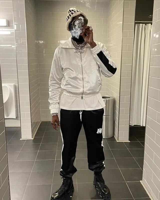 2 Chainz outfit in Versace, Fendi, and Amiri, 2021