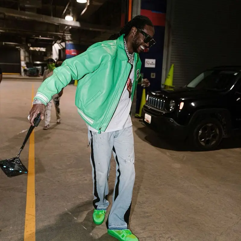 2 Chainz outfit in Avirex and Louis Vuitton, 2021