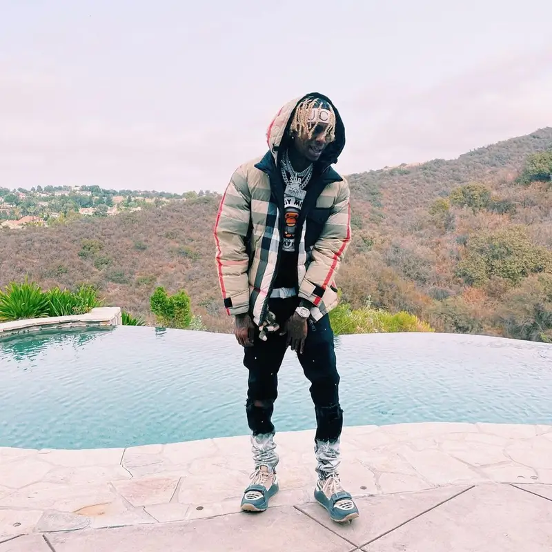 Soulja Boy outfit in Burberry, Bape, and Gucci, 2021