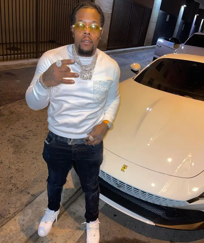 Rowdy Rebel outfit in Valentino, Amiri, and Louis Vuitton, 2021