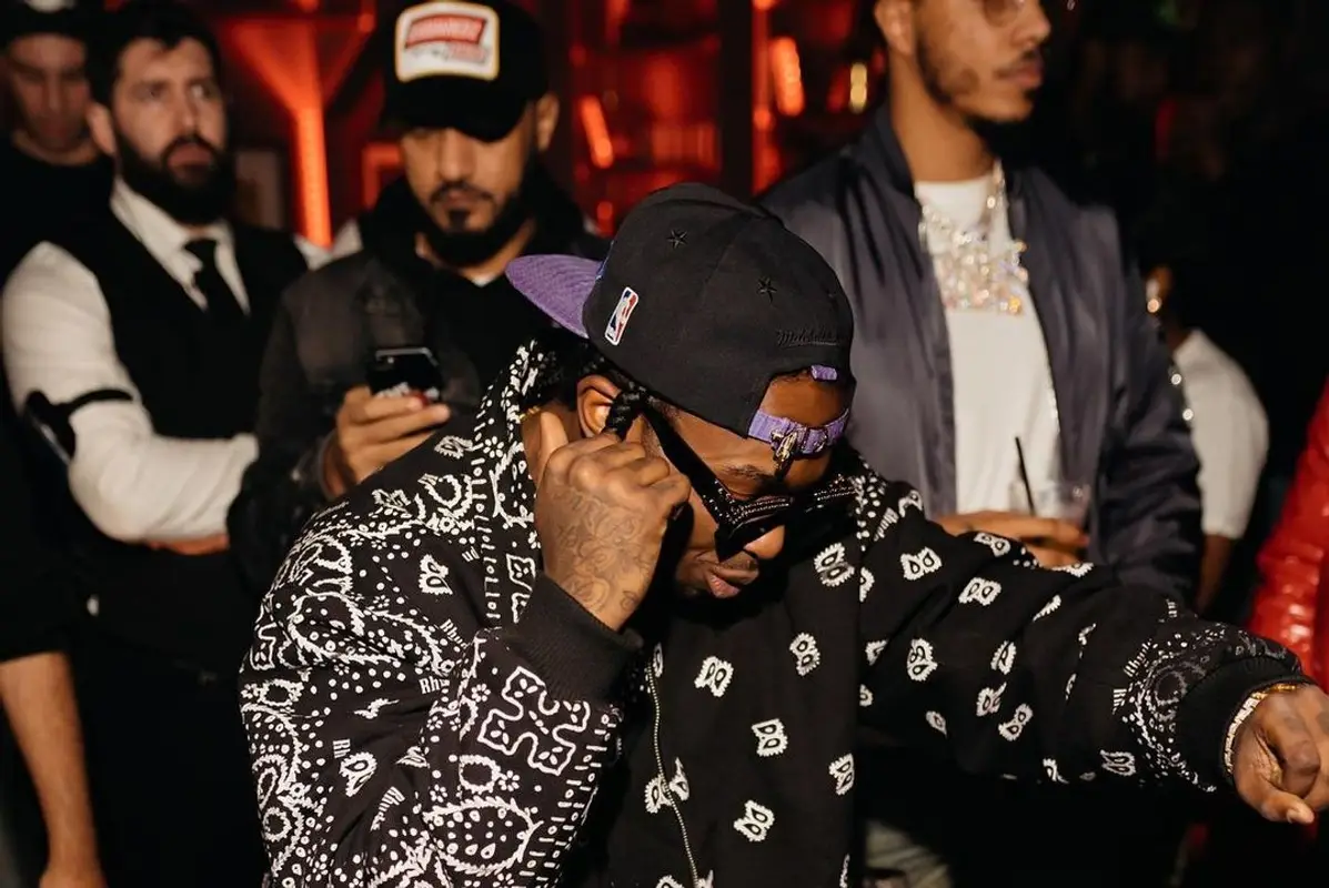 Pop Smoke outfit in Rhude and Louis Vuitton, 2021