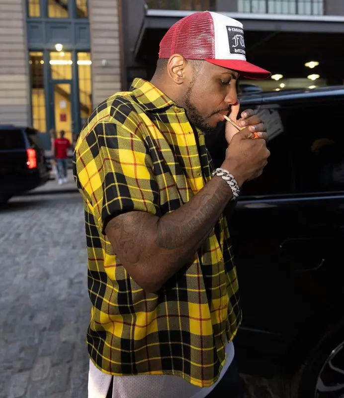 Fabolous outfit in Mitchell & Ness, Nike, and Chrome Hearts, 2021