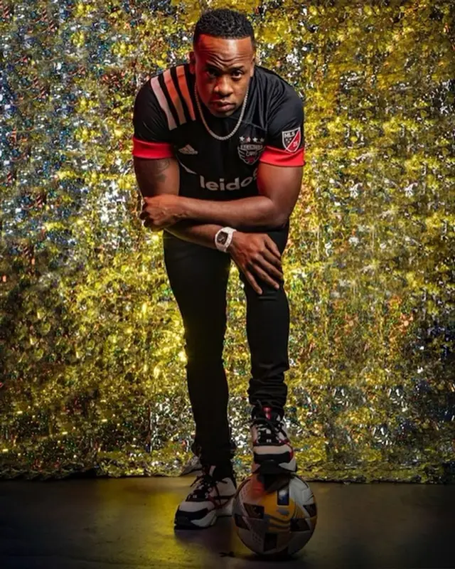 Yo Gotti outfit in Adidas, Amiri, and Dior, 2021
