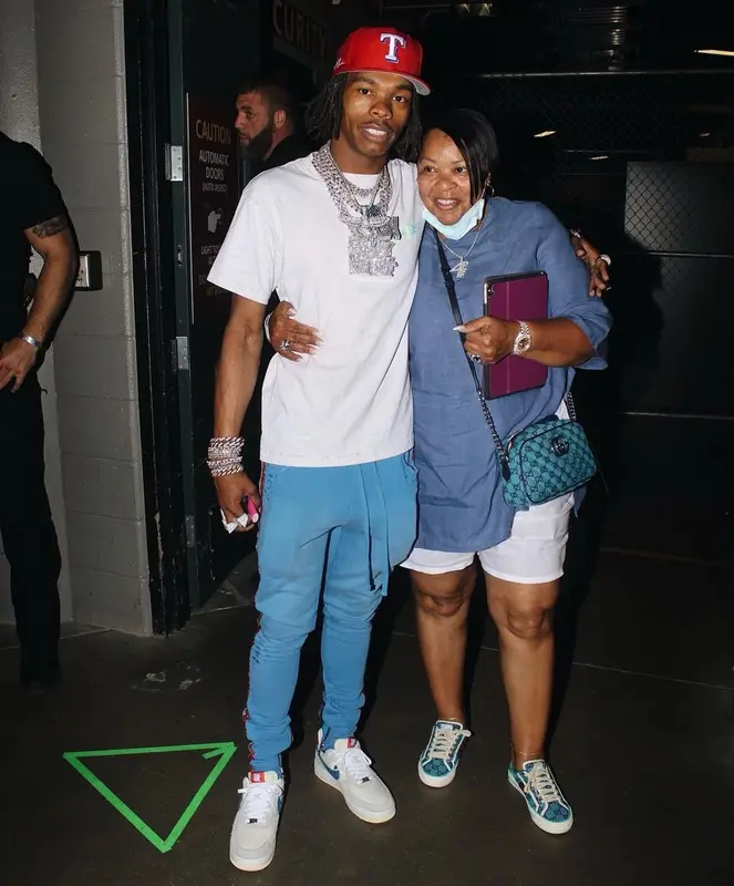 Lil Baby outfit in Alchemist, Nike, and New Era, 2021