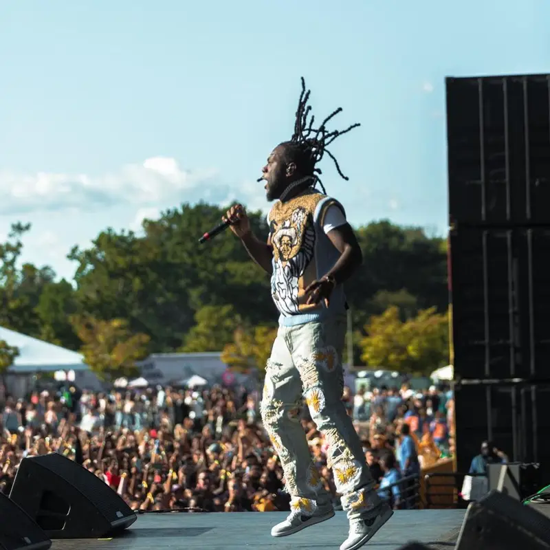 Burna Boy outfit in Who Decides War, Dior, and Calvin Klein, 2021