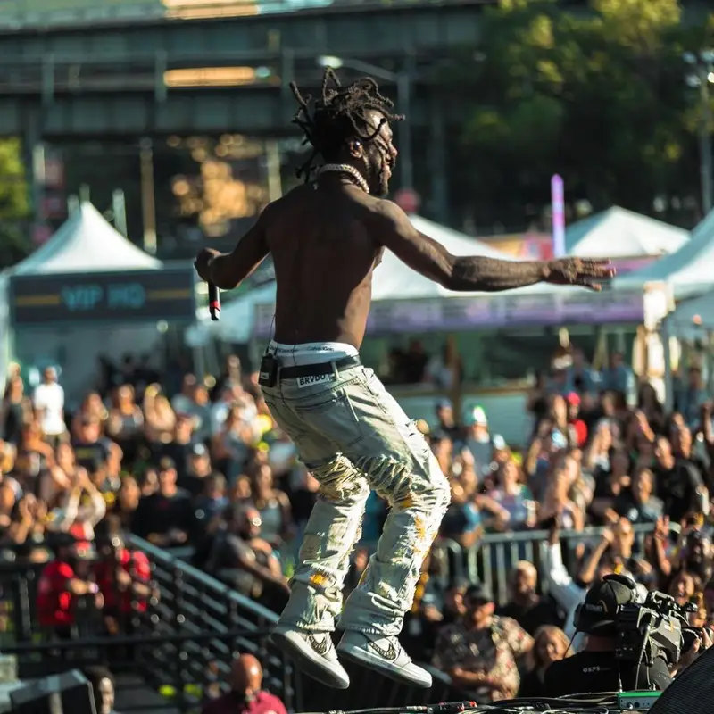 Burna Boy outfit in Who Decides War, Dior, and Calvin Klein, 2021