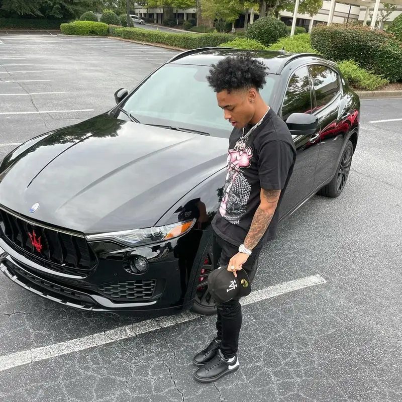 Luh Kel outfit in Amiri, Alexander McQueen, and New Era, 2021