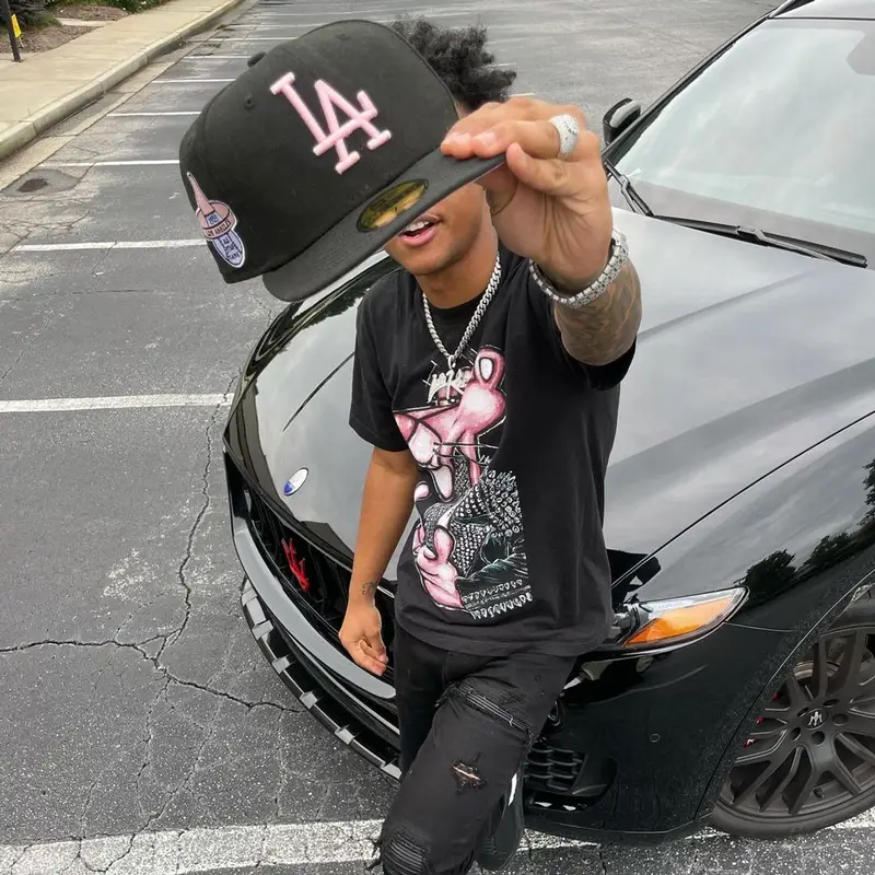 Luh Kel outfit in Amiri, Alexander McQueen, and New Era, 2021