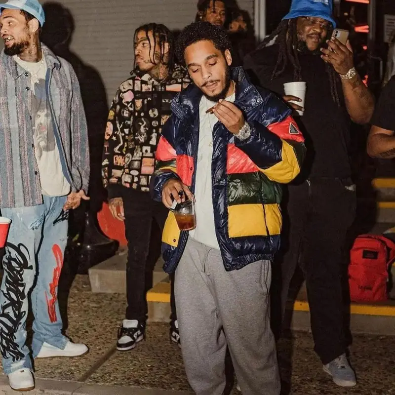 Chris Brown outfit in Cosey X Cosey, Nike, and Travis Scott Merch, 2021