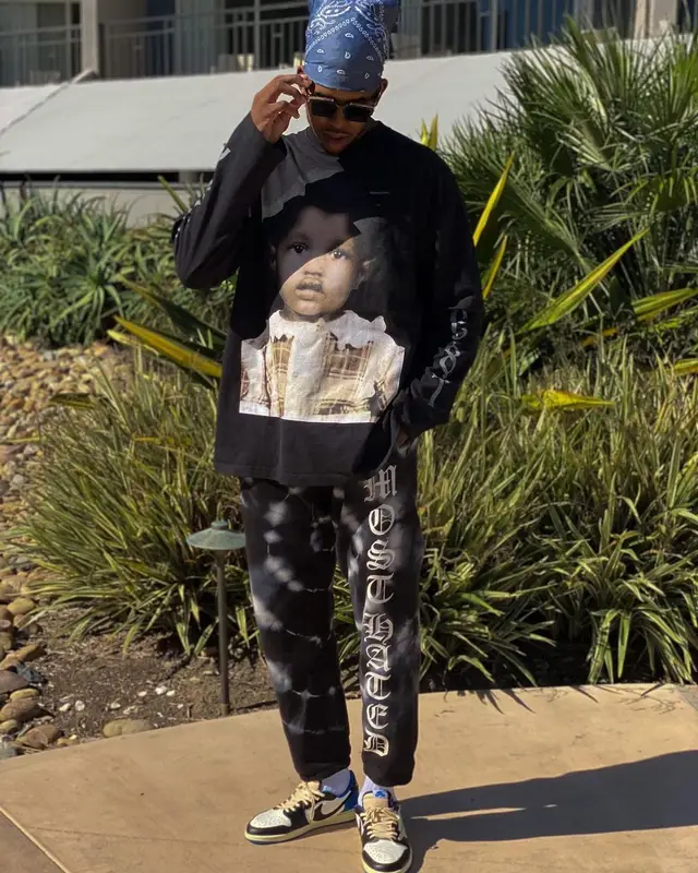 Nick Young outfit in Kanye West Merch, Nike, and Louis Vuitton, 2021