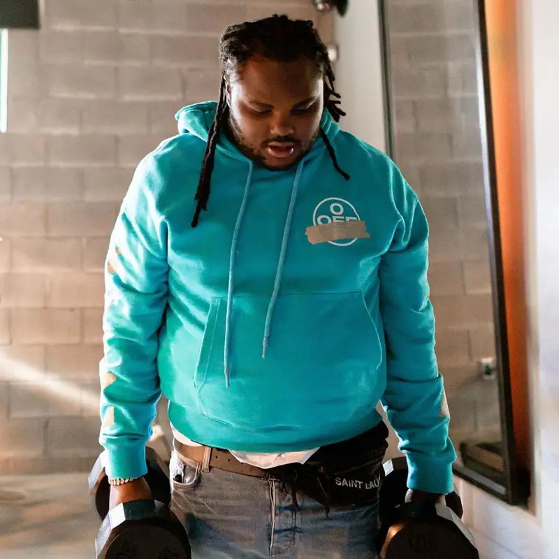 Tee Grizzley outfit in Off-White, Louis Vuitton, and Saint Laurent, 2021