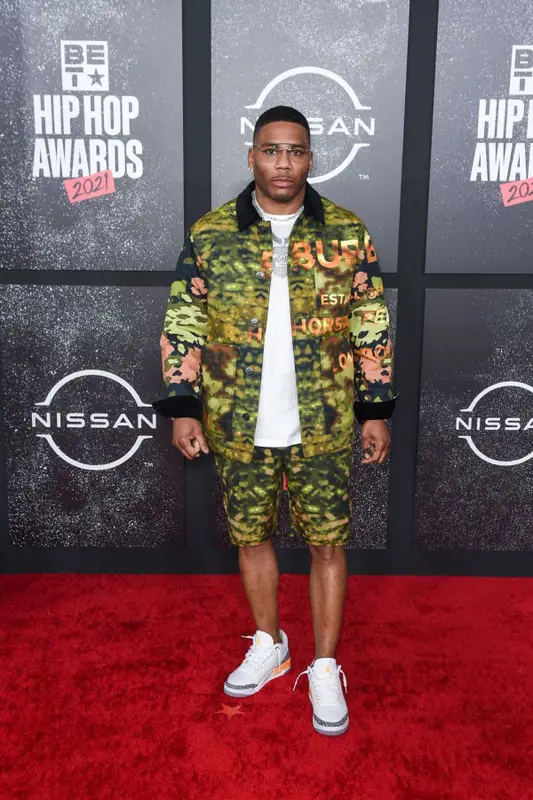 Nelly outfit in Burberry, Jordan, and Cartier, 2021