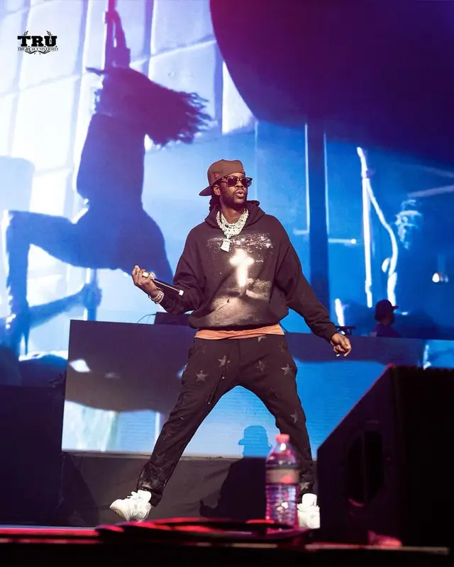 2 Chainz outfit in Amiri, New Era, and Chemist, 2021