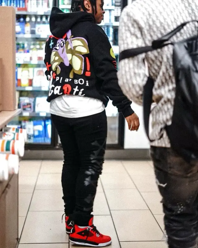 42 Dugg outfit in Cactus Plant Flea Market, Supreme, and Playboi Carti Merch, 2021