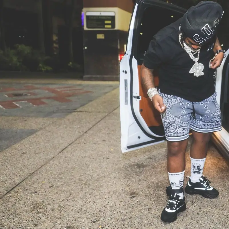 42 Dugg outfit in Amiri, Supreme, and New Era, 2021