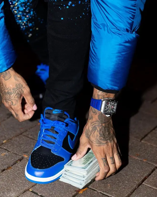 Lil Durk outfit in Burberry, Amiri, and Richard Mille, 2021