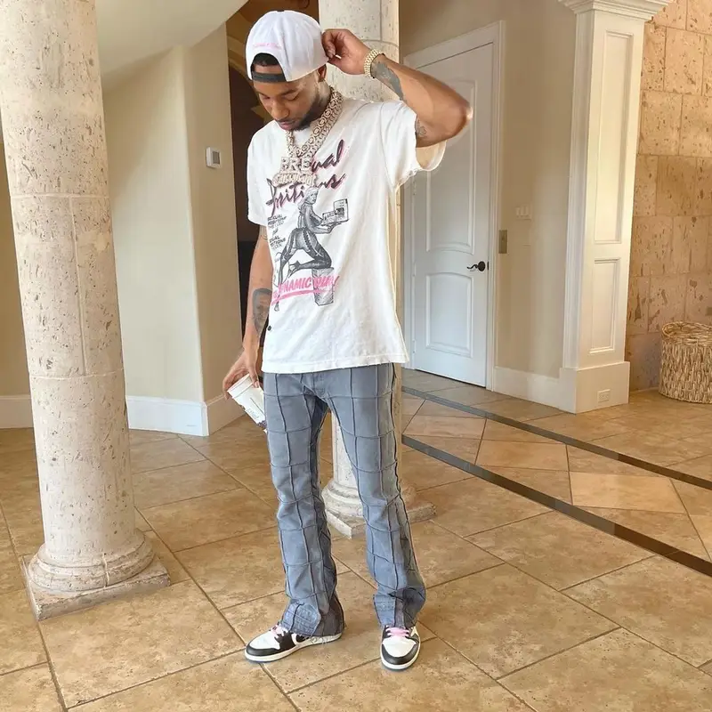 Key Glock outfit in Gallery Dept., Nike, and Travis Scott Merch, 2021