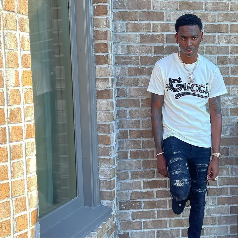 Young Dolph outfit in Gucci, Amiri, and Nike, 2021