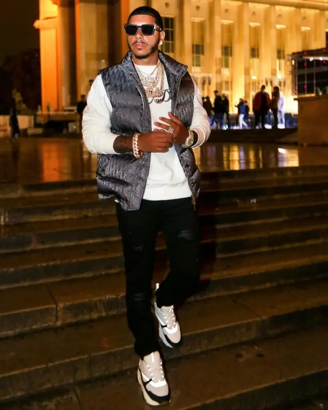 CJ outfit in Dior, Amiri, and Louis Vuitton, 2021