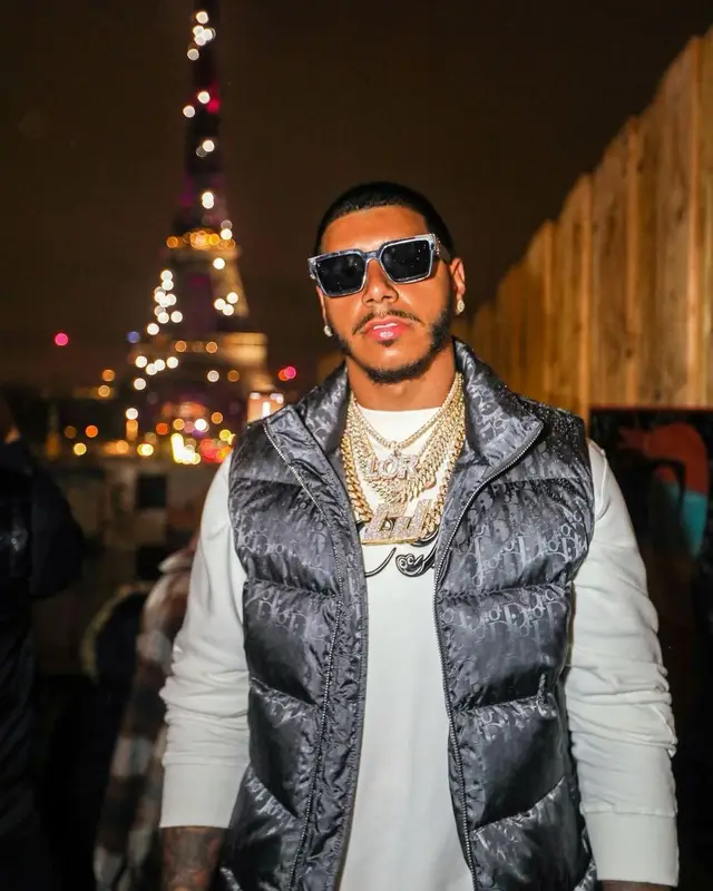 CJ outfit in Dior, Amiri, and Louis Vuitton, 2021